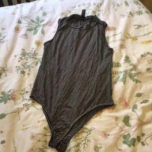 Black and white stripped body suit